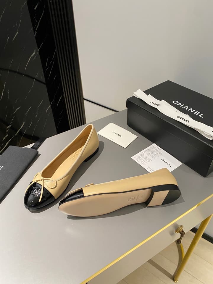 Chanel Classic Ballet Flats in Tan With Black Cap Toe