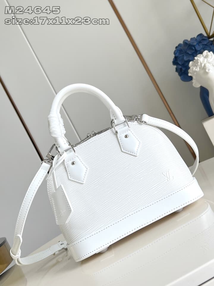 Louis Vuitton Alma BB Handbag in Beige