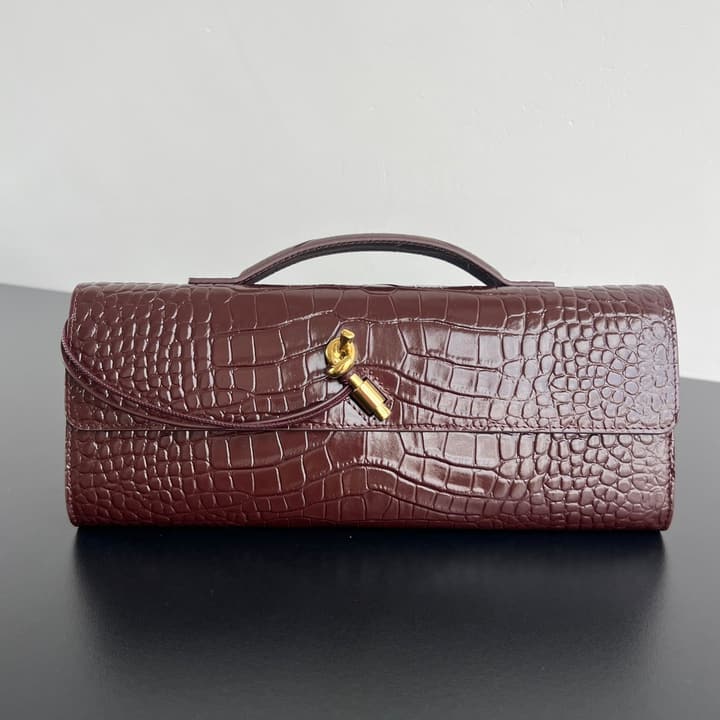 Bottega Veneta Crocodile Embossed Intrecciato Clutch in Gold