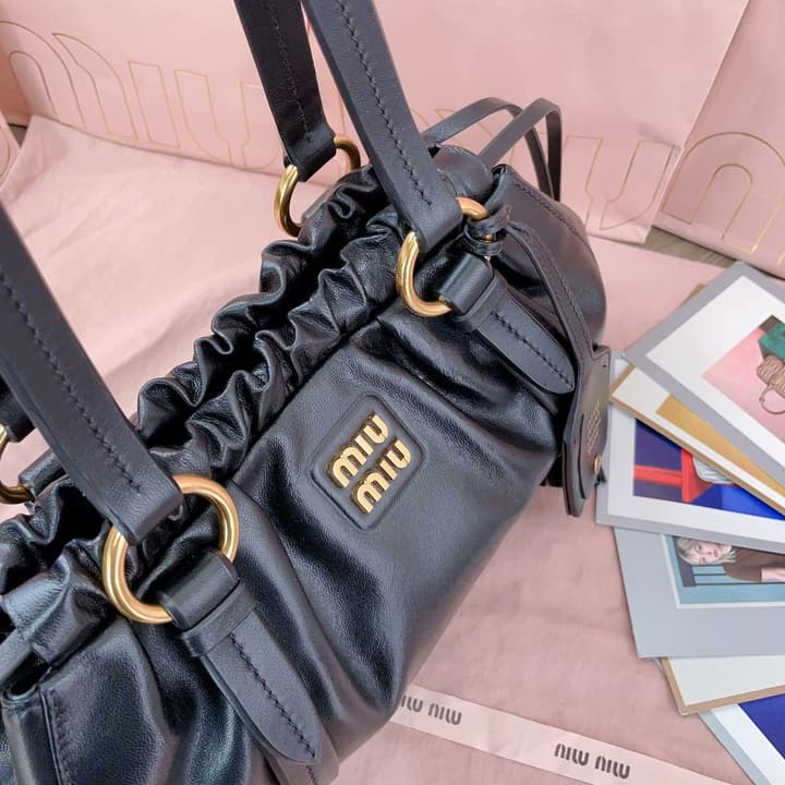Miu Miu Tassel Drawstring Bucket Bag – New Collection in Black