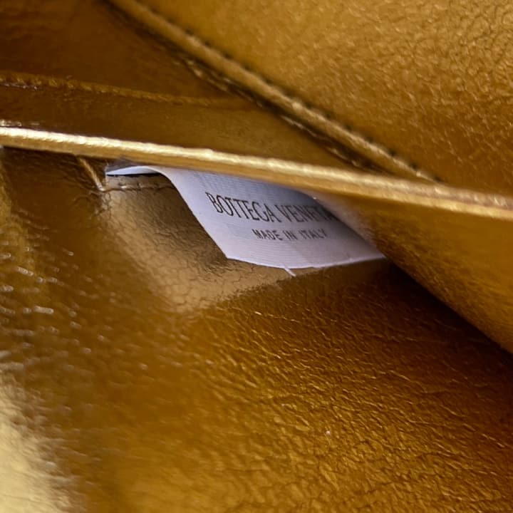 Bottega Veneta Intrecciato Vanity Case in Metallic Gold
