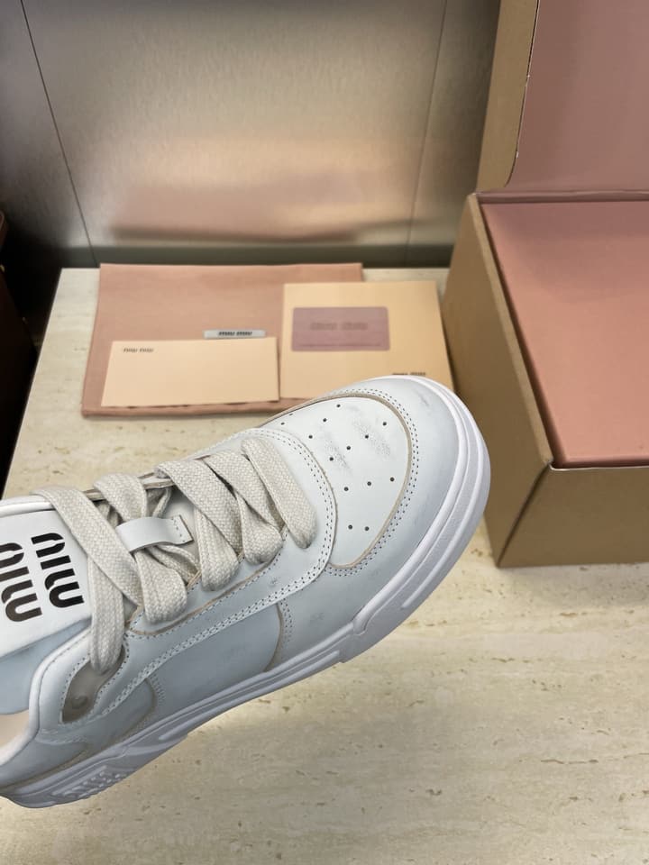 Miu Miu 2025FW Runway Lace-Up Casual Sneakers – 2025FW in Distressed Off-white Sneaker