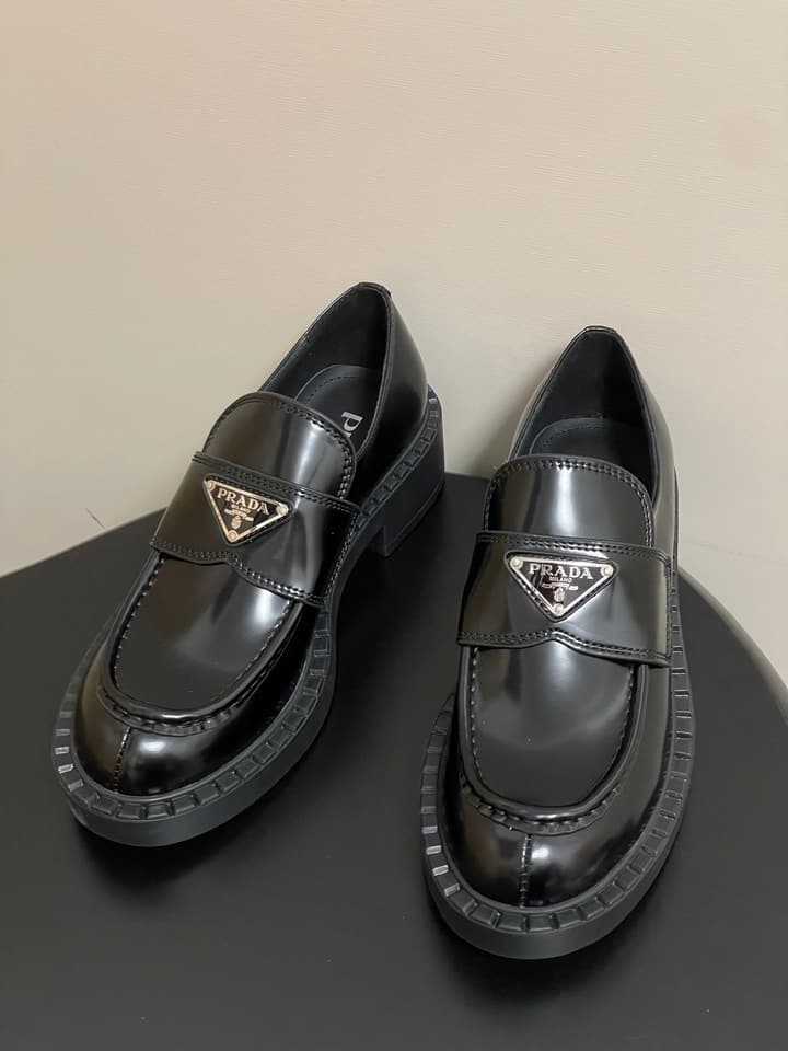 Prada Triangle Logo Platform Loafers in Black