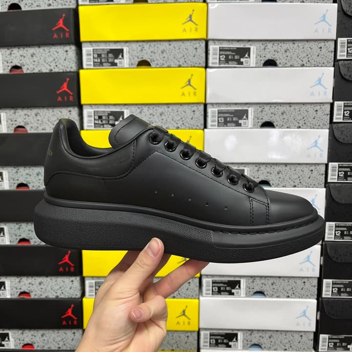 Alexander McQueen Oversized Low-Top Sneakers in All Black With White Sole