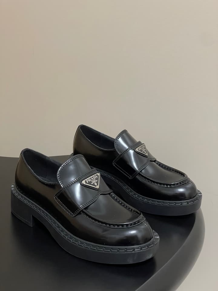 Prada Triangle Logo Platform Loafers in Black