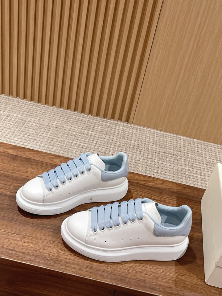Alexander McQueen Classic Versatile White Sneakers in White With Black Laces & Heel