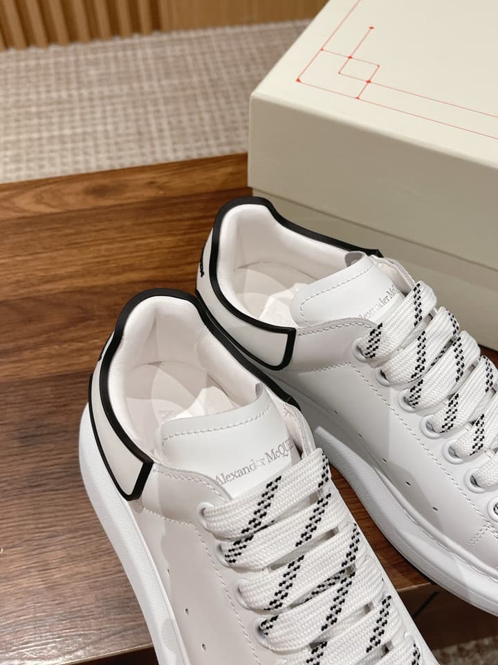 Alexander McQueen Classic Versatile White Sneakers in White With Black Laces & Heel