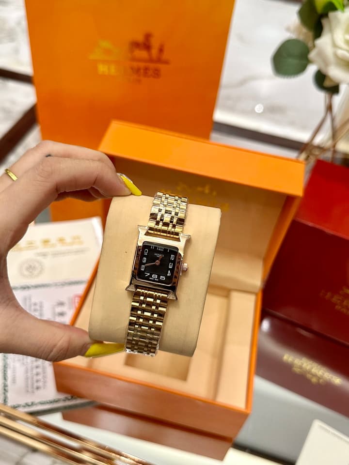 Hermès Small Square Luxury Watch in Dark Dial Patterned Gold Bracelet