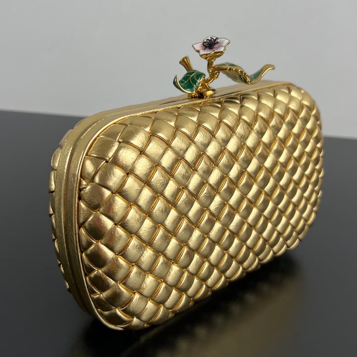 Bottega Veneta Woven Leather Floral Knot Clutch Bag in Gold Woven Leather With Floral Clasp