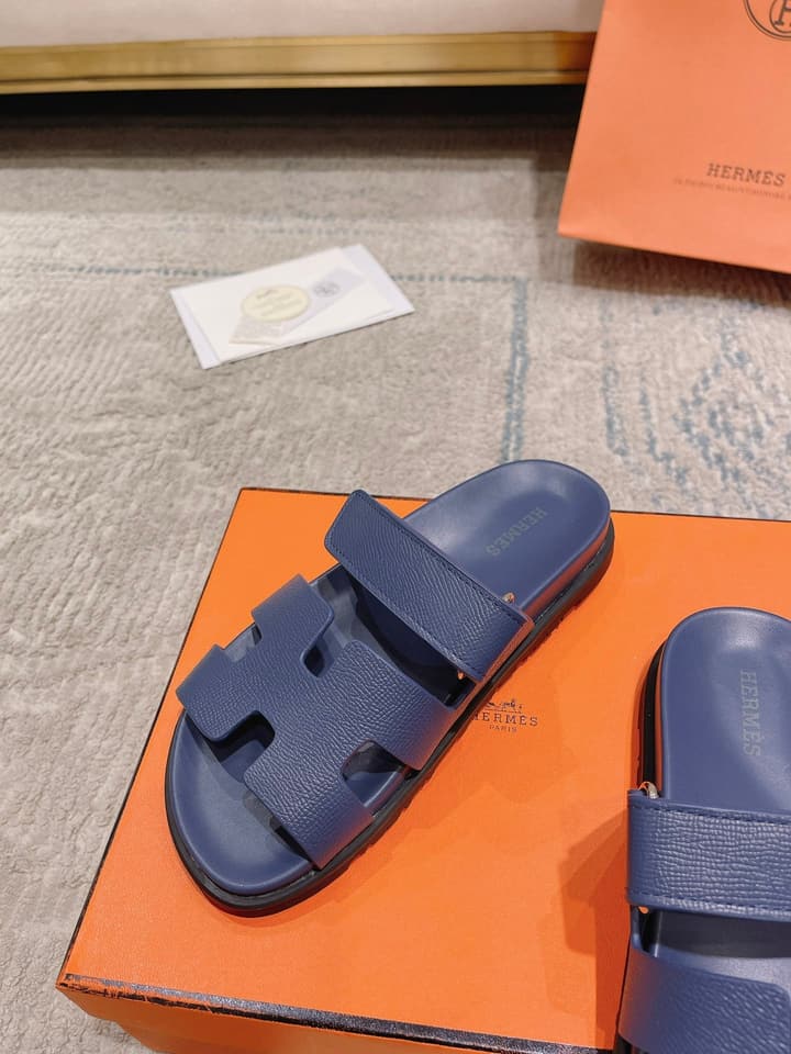 Hermès Chypre Suede Unisex Slides in Black With Dark Blue Strap