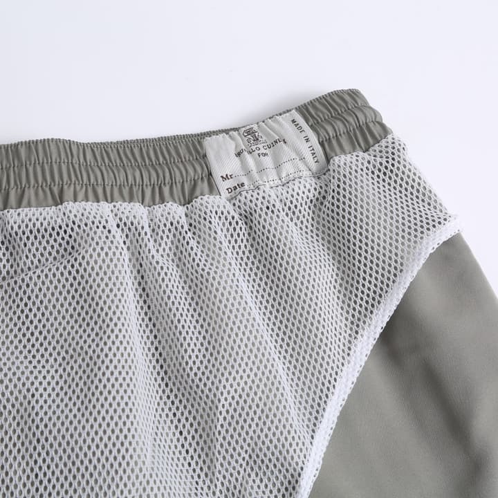 Brunello Cucinelli Embroidered Swim Trunks in Navy Blue