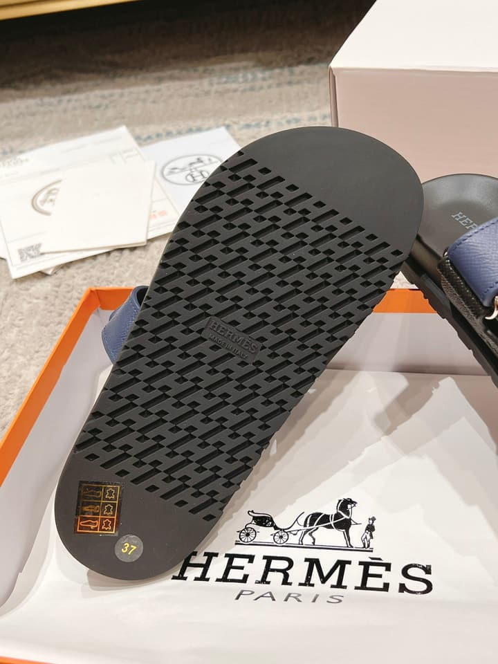 Hermès Chypre Suede Unisex Slides in Black With Dark Blue Strap