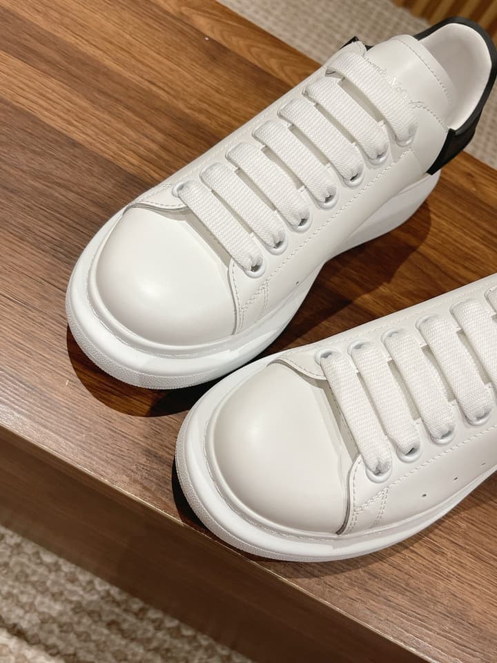 Alexander McQueen Classic Versatile White Sneakers in White With Black Laces & Heel