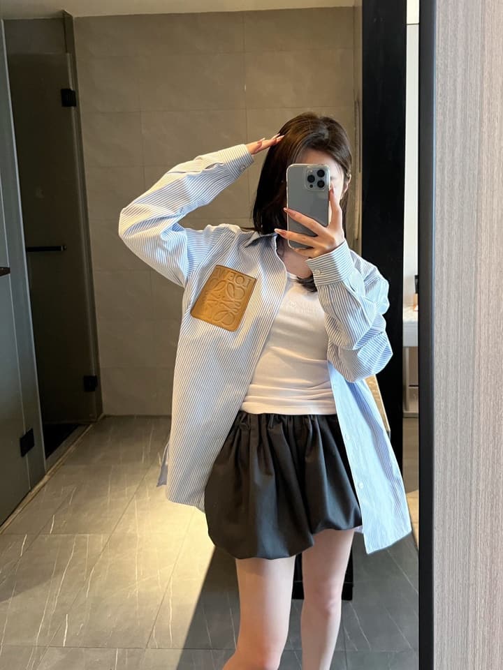 Loewe Embossed Logo Suede Pocket Striped Shirt in Tan Loewe Pouch, Light Blue Overshirt, Black Skirt - View 1