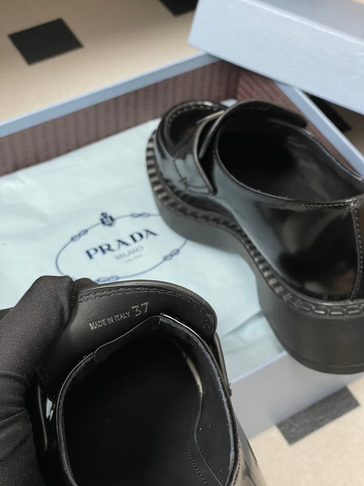 Prada Triangle Logo Platform Loafers in Black