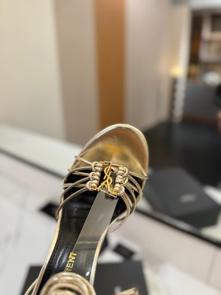 Saint Laurent Letter Buckle Pumps in Bright Gold