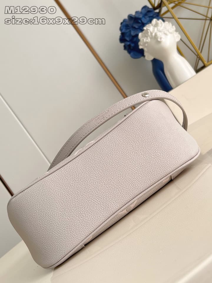 Louis Vuitton Boulogne Monogram Embossed Bag in Beige