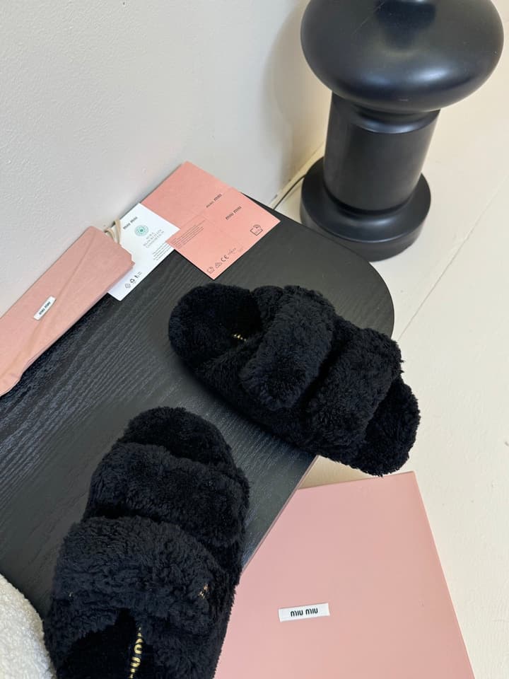 Miu Miu Sheepskin Mules in Black