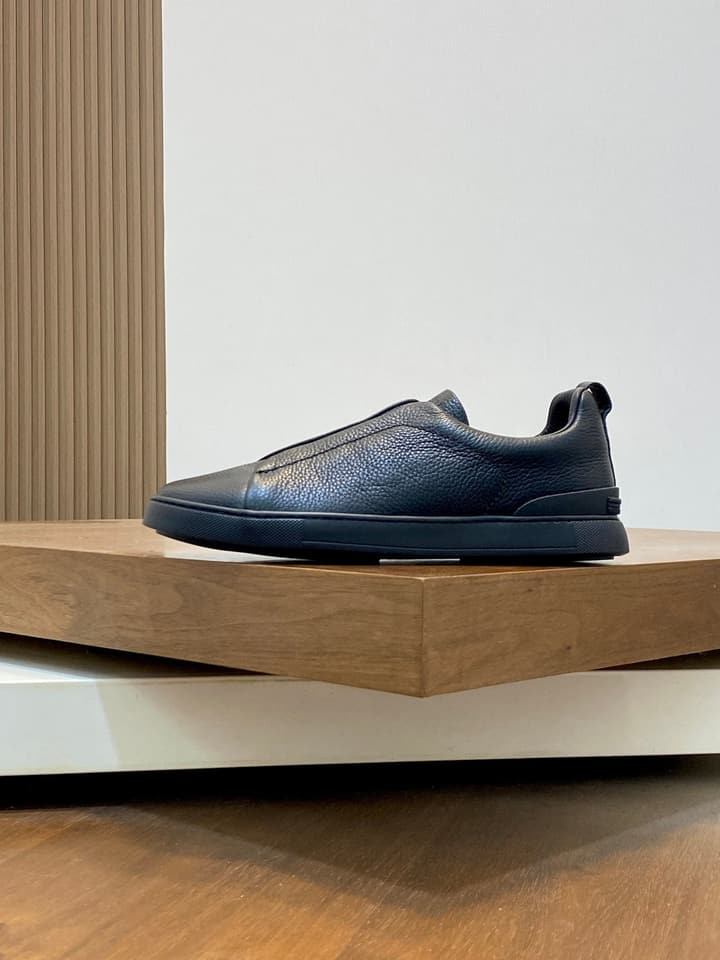 Ermenegildo Zegna Triple Stitch Sneakers in Black Leather With Brown Tag