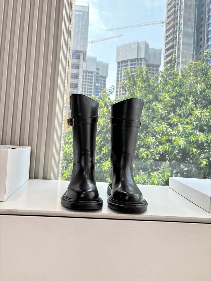Celine Triomphe Knight Ankle Boots – 2025 Fall/Winter Collection in Black And Brown Leather Display
