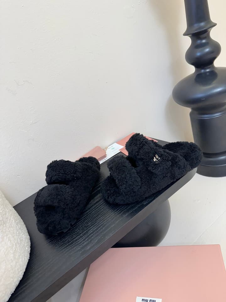 Miu Miu Sheepskin Mules in Black