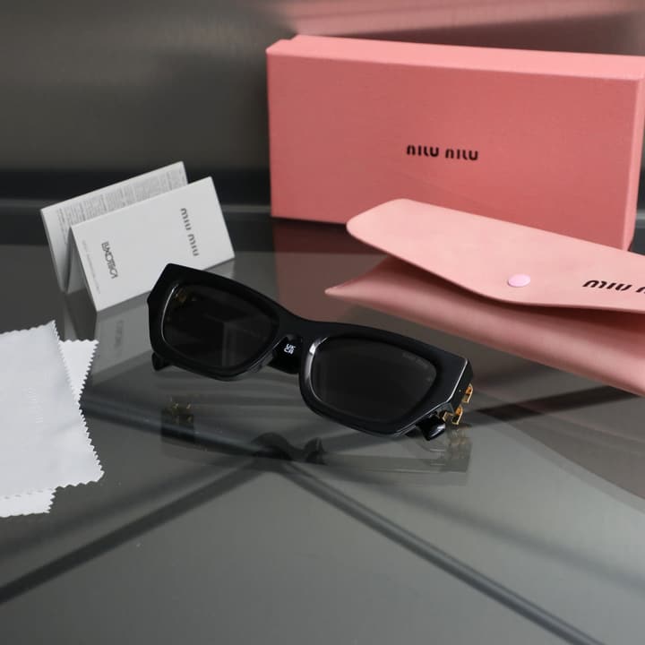 Miu Miu 2025 Cat-Eye Sunglasses – 2025 Collection in Gold