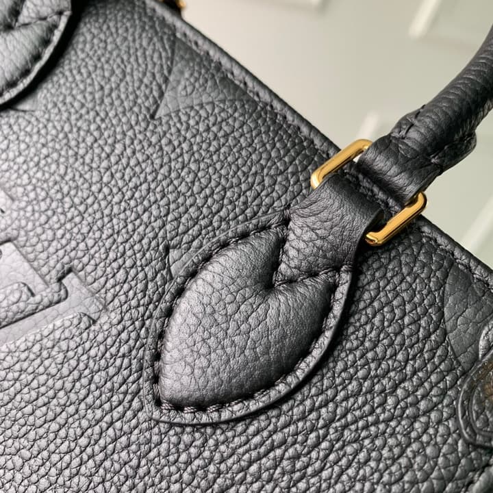 Louis Vuitton OnTheGo BB Monogram Empreinte Handbag in Beige And Cream Monogram
