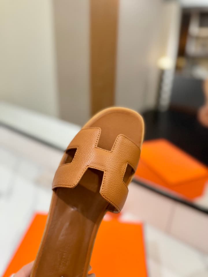 Hermès Classic H Palm Grain Leather Sandals in Black