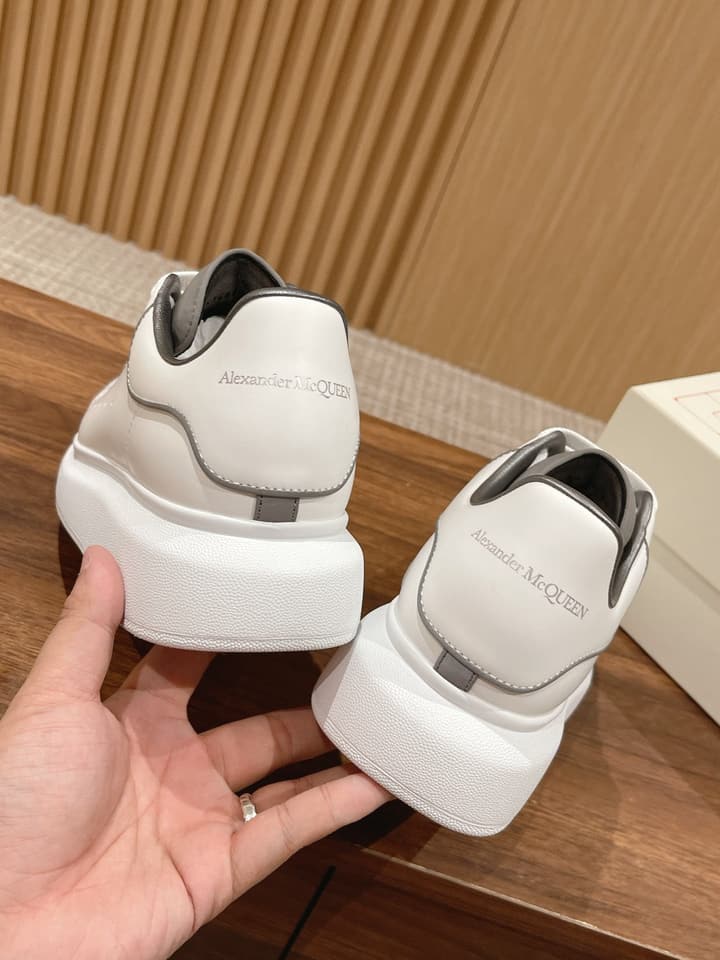 Alexander McQueen Classic Versatile White Sneakers in White With Black Laces & Heel