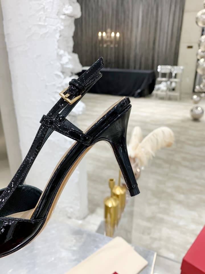 Valentino VLogo Pointed-Toe Patent Leather Pumps in Black Patent