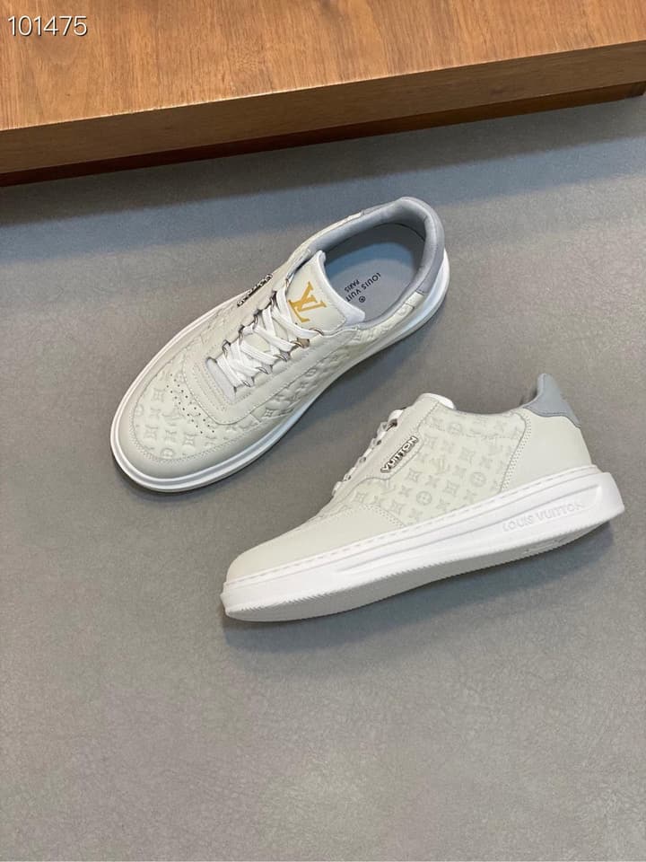 Louis Vuitton Embossed Calfskin Sneakers in Black