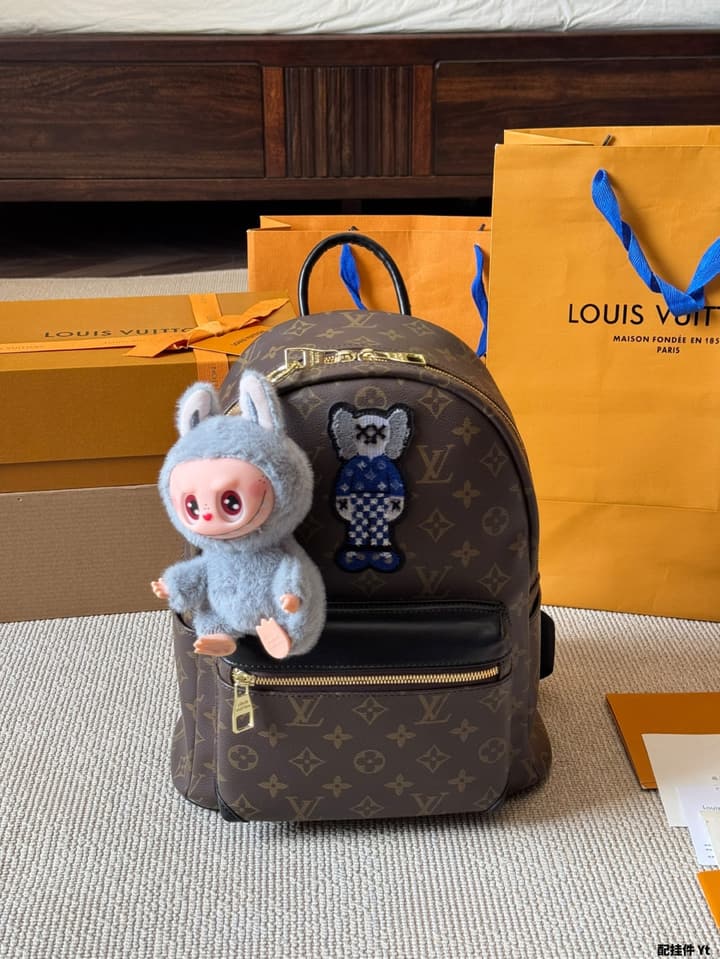 Louis Vuitton Monogram Mini Backpack in Monogram With Light Blue Charm