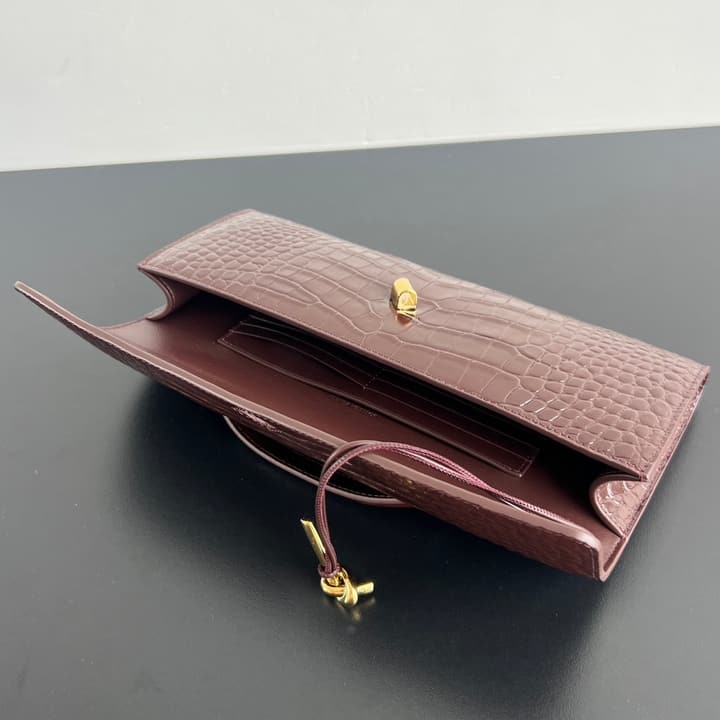 Bottega Veneta Crocodile Embossed Intrecciato Clutch in Gold