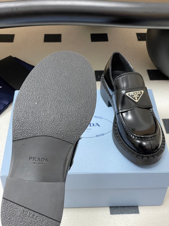Prada Triangle Logo Platform Loafers in Black