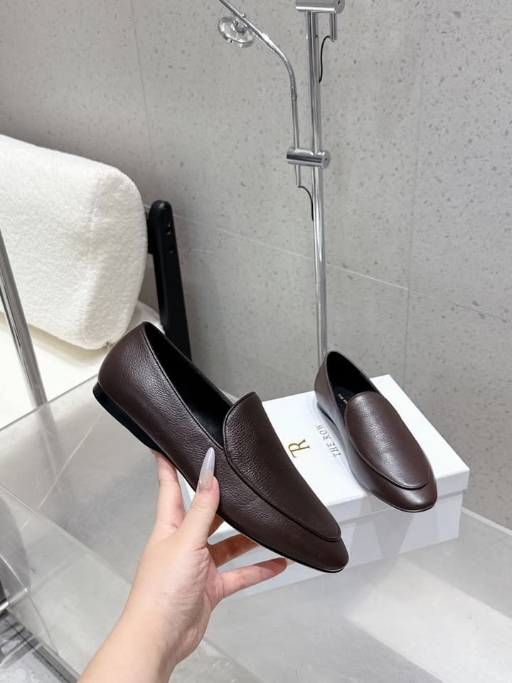 The Row Tassel Loafers in Black Suede