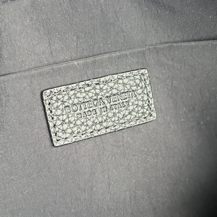Bottega Veneta Intrecciato Grained Pouch in Black Woven Leather