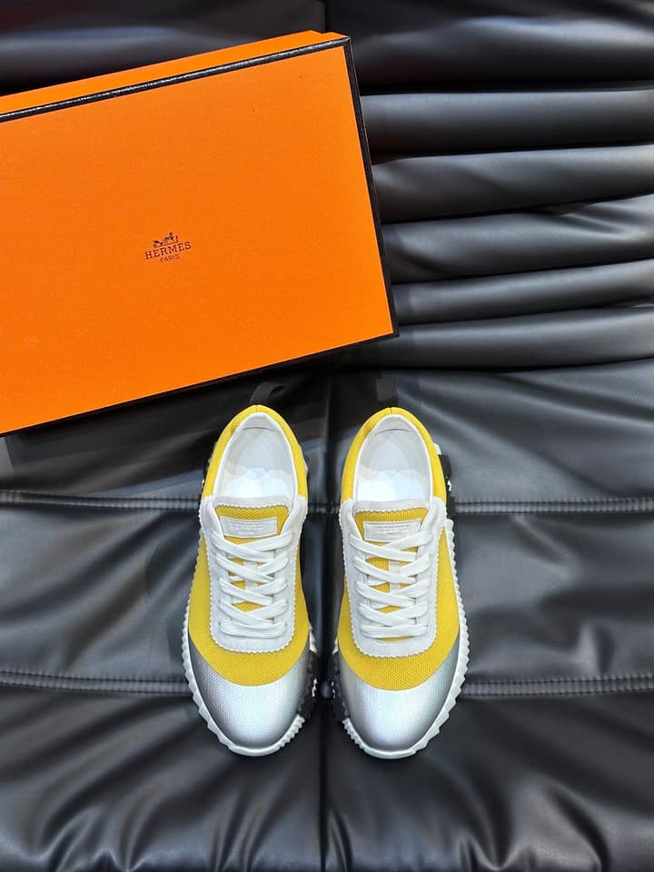 Hermès Bouncing Calfskin Mesh Sneakers in Black With White Stripe