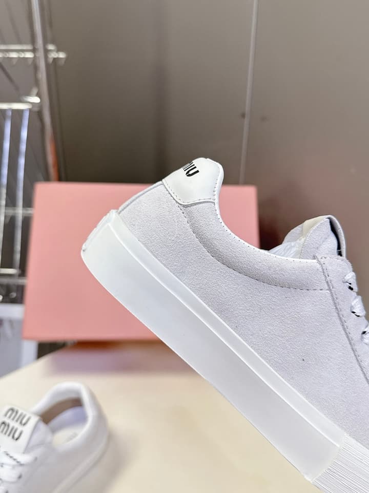 Miu Miu Distressed Retro Double Lace Sneakers in Red