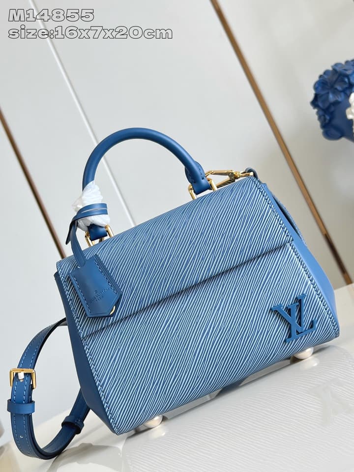 Louis Vuitton Cluny Mini Handbag in Beige