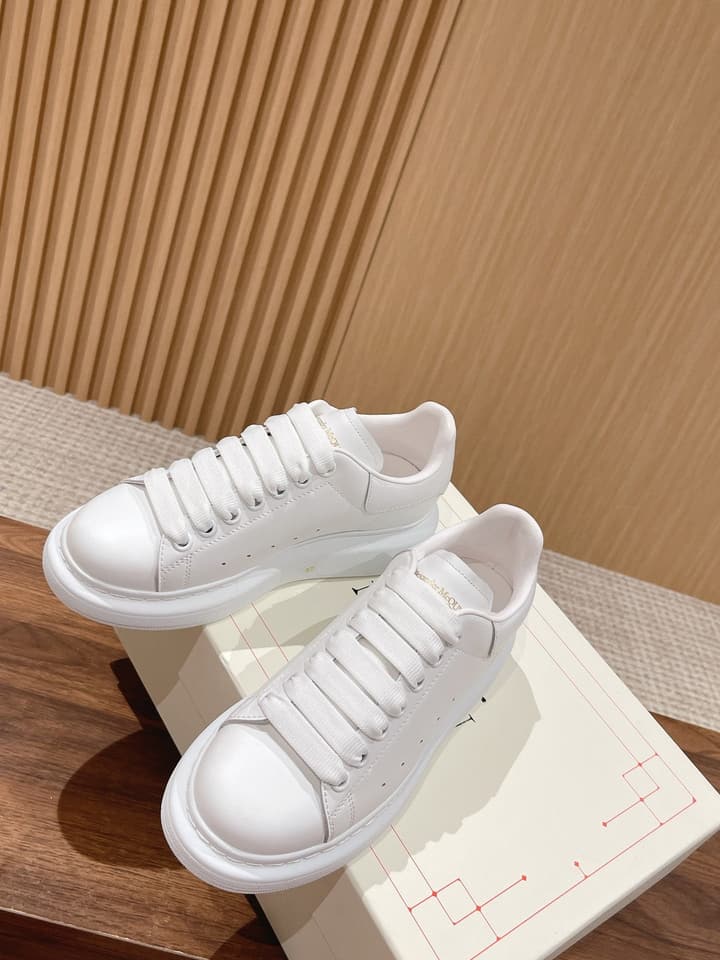 Alexander McQueen Classic Versatile White Sneakers in White With Black Laces & Heel