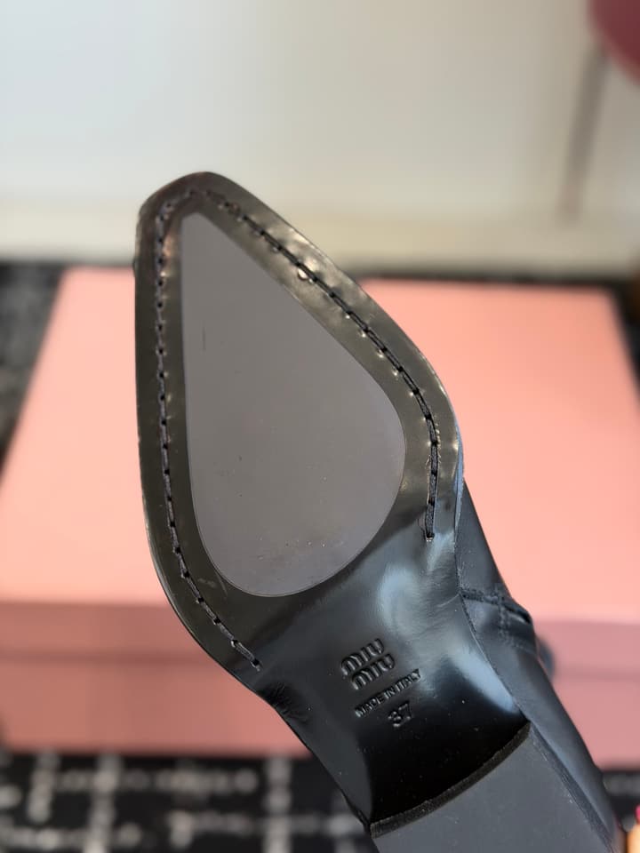 Miu Miu Distressed Leather Biker Boots – 2026SS