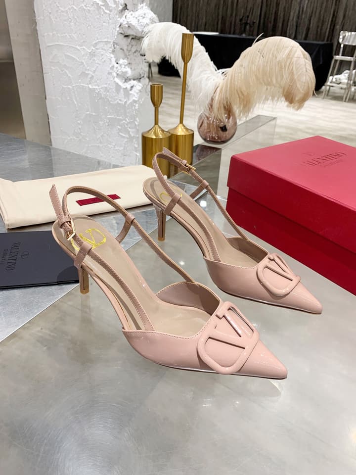 Valentino VLogo Pointed-Toe Patent Leather Pumps in Black Patent