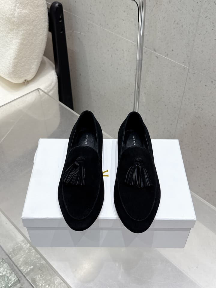 The Row Tassel Loafers in Black Suede