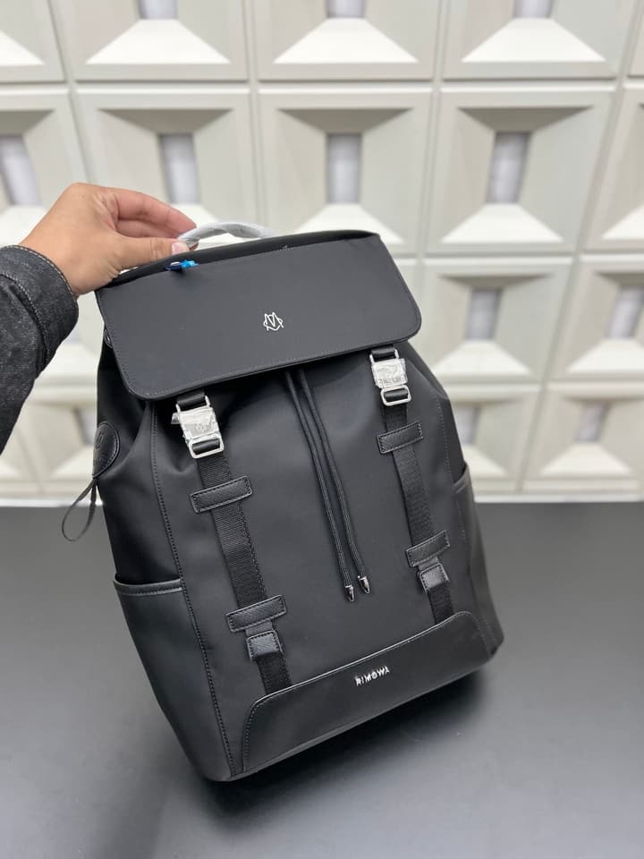 RIMOWA Never Still Canvas Flap Backpack in Black Canvas