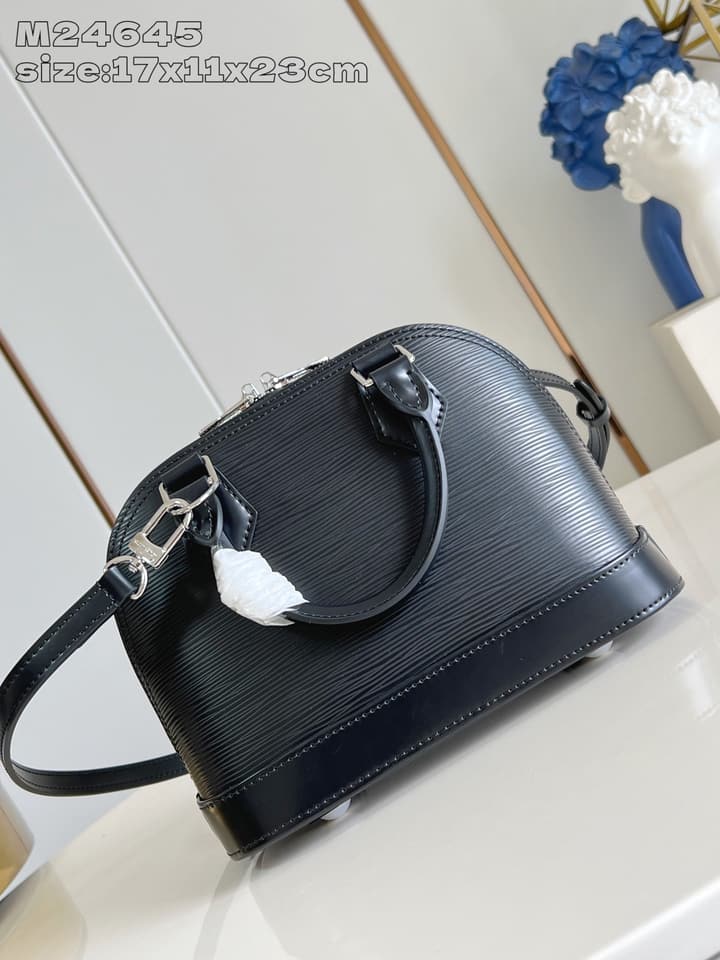 Louis Vuitton Alma BB Handbag in Beige