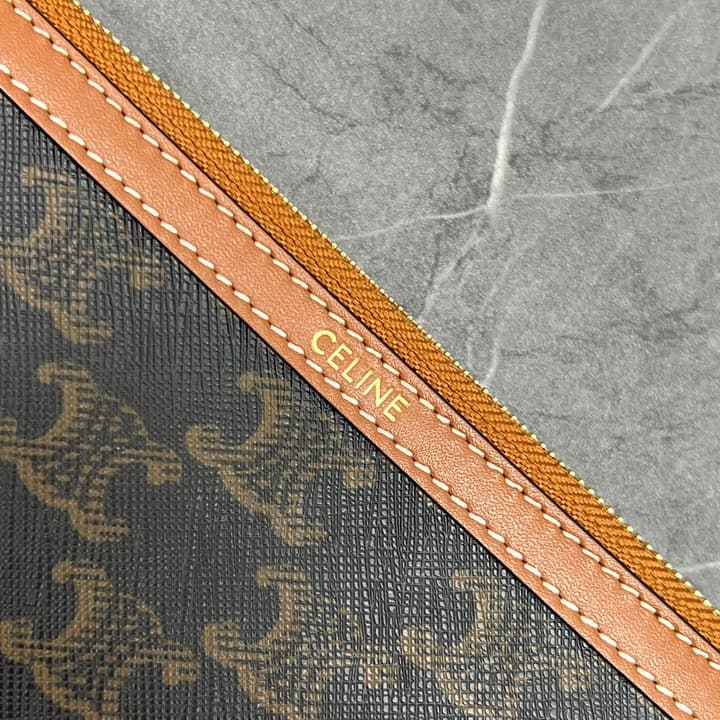 Celine Clutch Bag with Wrist Strap in Dark Monogram With Brown Trim