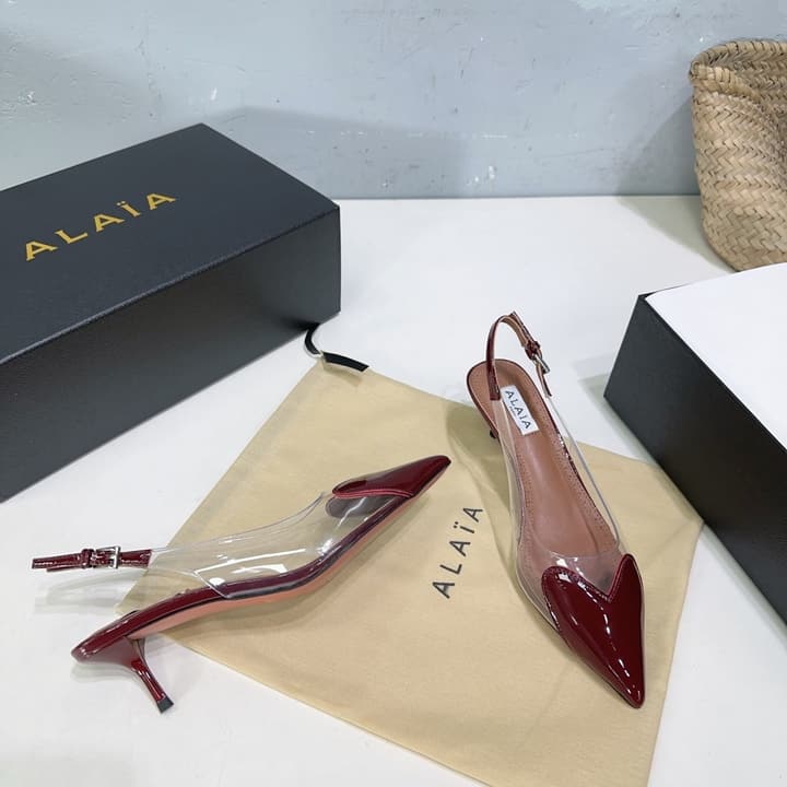 Alaïa Heart PVC Pointed Toe Slingback Mules – Spring/Summer 2025 in Red Patent Toe / Clear Pvc