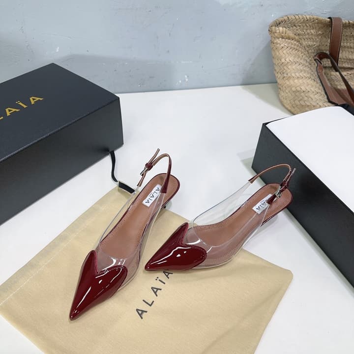 Alaïa Heart PVC Pointed Toe Slingback Mules – Spring/Summer 2025 in Red Patent Toe / Clear Pvc