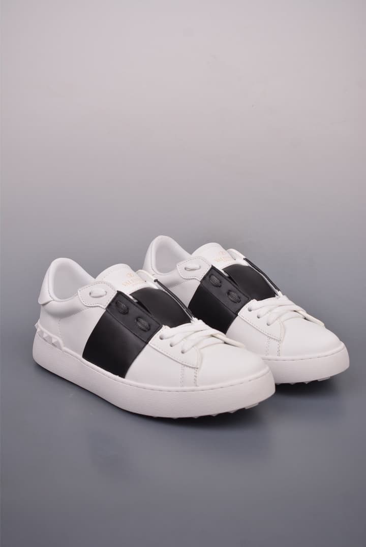 Valentino Rockstud Untitled Rivet Sneakers – 2025 Collection in White With Black Band