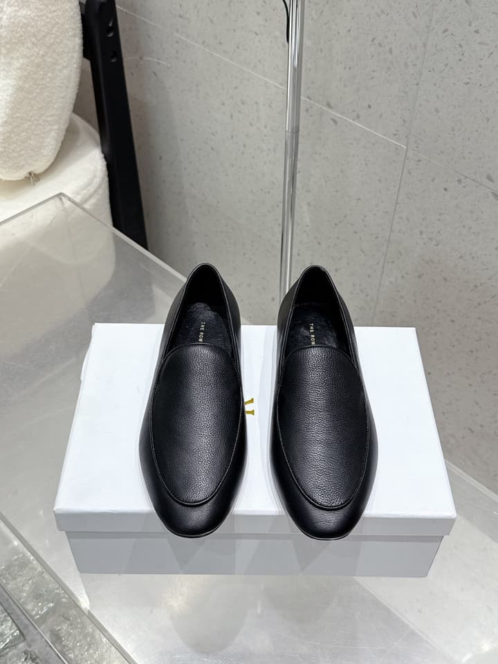 The Row Tassel Loafers in Black Suede